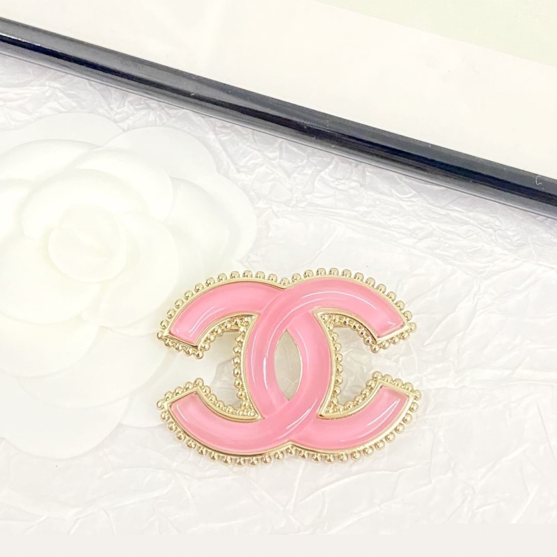 Ch*el brooches